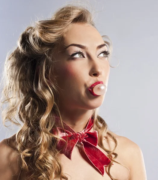 Pretty woman blowing bubble — Stock Photo, Image