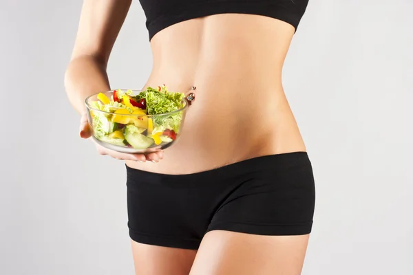 Sports pres young girl. Salad — Stock Photo, Image