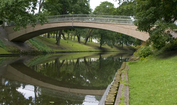 stock image Bridge in City park in centre of Riga