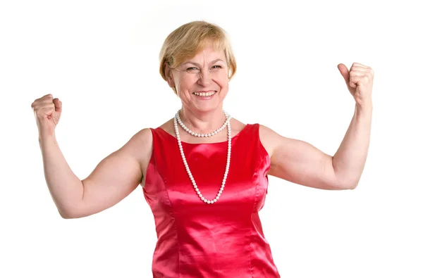 Retrato de mulher idosa em forma flexionando seu bíceps — Fotografia de Stock