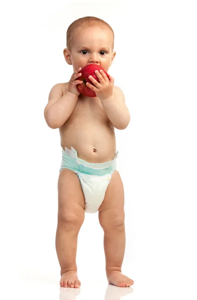 Ett - årig pojke med rött äpple över vita — Stockfoto