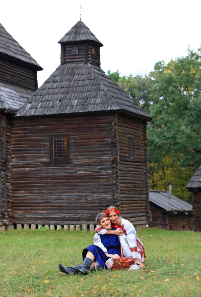 stock image Two female friends in Ukrainian costumes