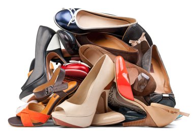 Pile of various female shoes, with clipping path clipart