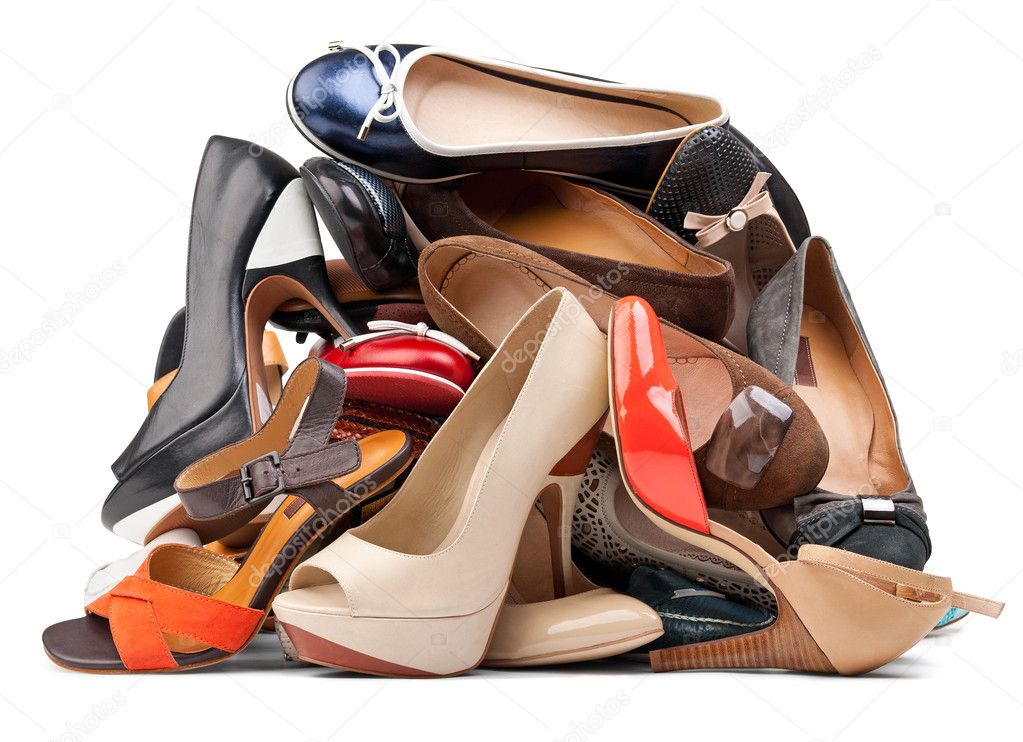 Pile of various female shoes, with clipping path