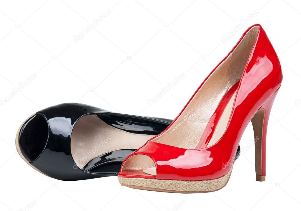 Two patent leather female shoes shoes over white