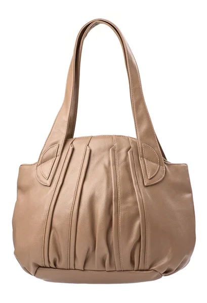 Beige kvinnliga handväska över vita — Stockfoto