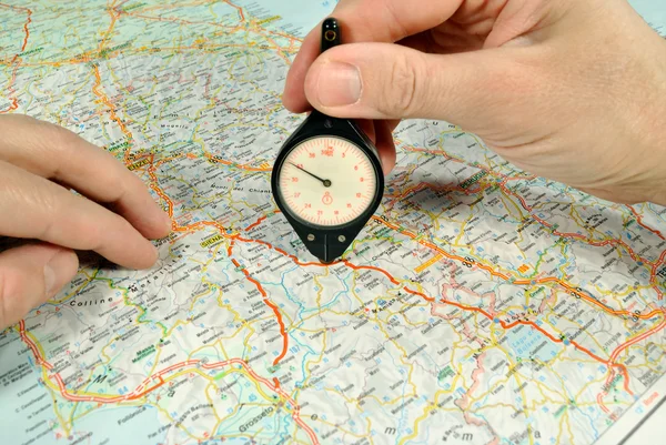 The measuring of distance by rotameter on the map. — Stock Photo, Image