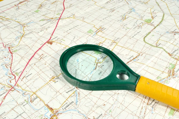 The chart of country and magnifying glass — Stock Photo, Image