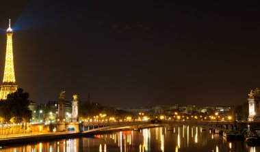 PARIS - SEPTEMBER 25: Eiffel Tower with night illumination and l clipart