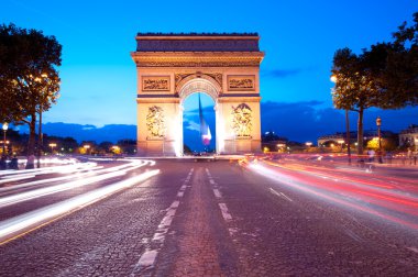 Evening traffic on Champs-Elysees in front of Arc de Triomphe (P clipart