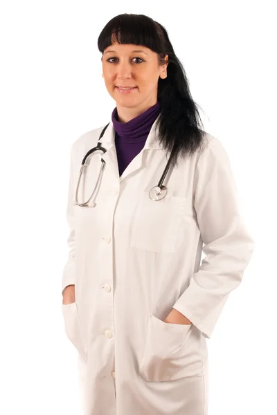 Доктор - жінка в білій медичній сукні зі стетоскопом — стокове фото