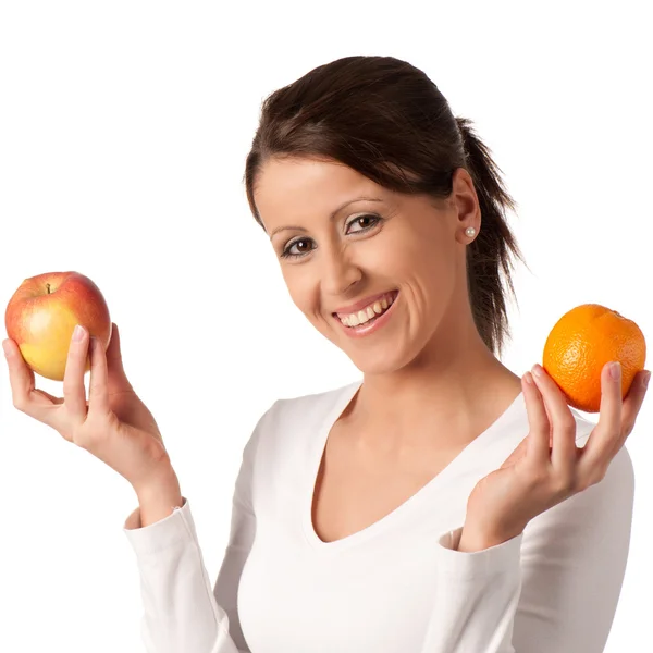 Atractiva mujer joven con un plato de diferentes frutas —  Fotos de Stock