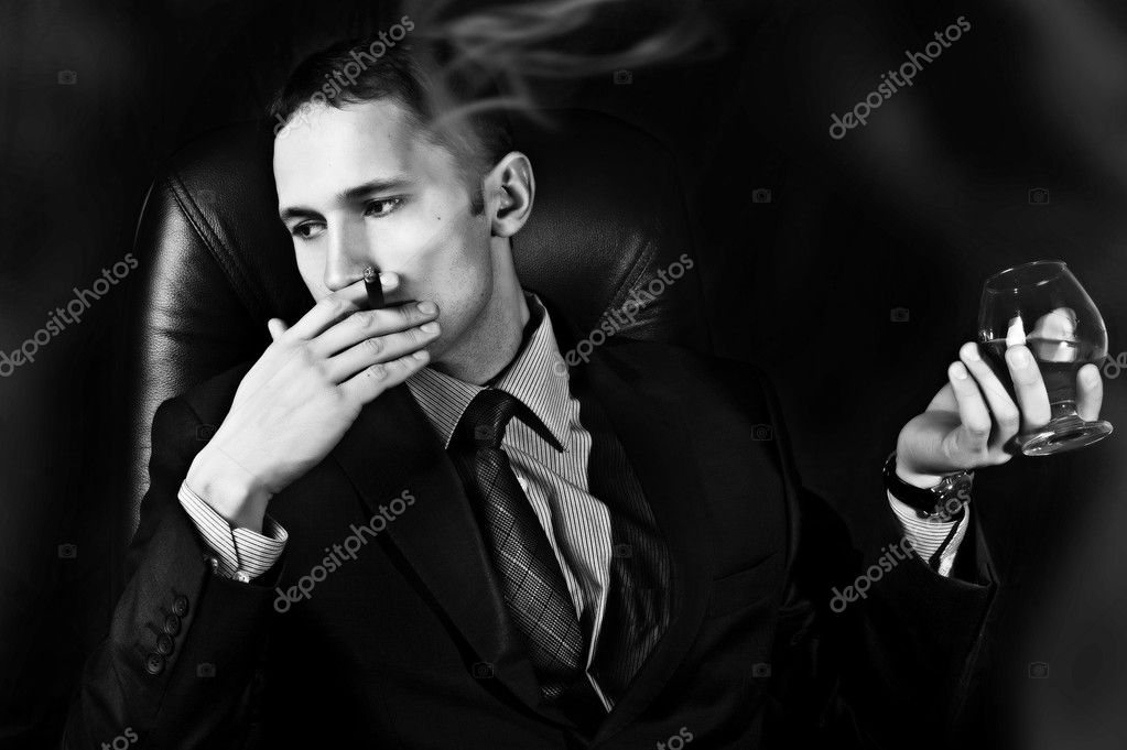 Man with Old Brandy Glass, smoking cigar — Stock Photo © katalinks #8958699