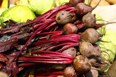 Various vegetables at vegetable market. India clipart