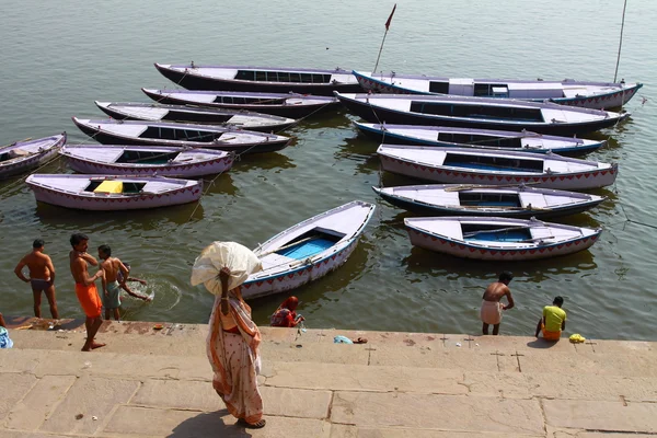 stock image Colorful boats on brown waters of Ganges river, Varanasi, India