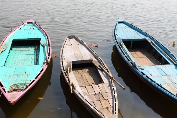 stock image Colorful boats on brown waters of Ganges river, Varanasi, India