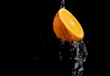 Fresh water splash and orange clipart