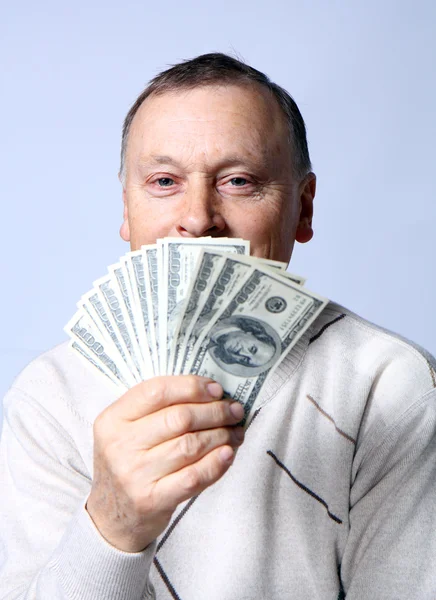 Retrato de homem maduro segurando dólares — Fotografia de Stock
