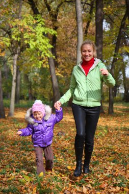 The woman with her daughter clipart