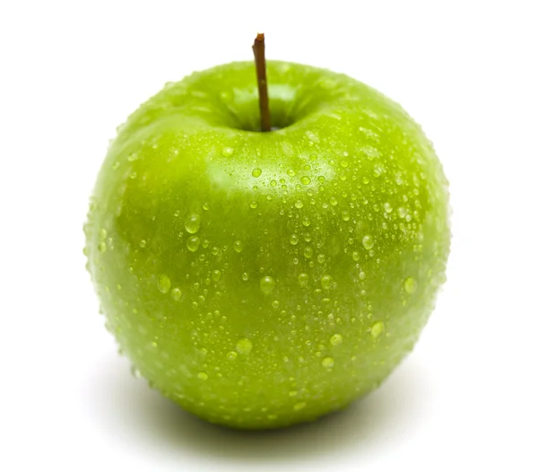 Stock image Green apple with water drops close up