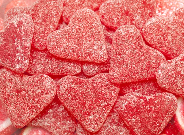 Achtergrond van hart-vormige snoepjes — Stockfoto