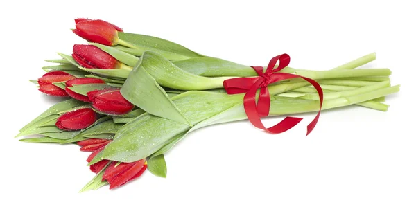 Red tulips tied with a red ribbon — Stock Photo, Image
