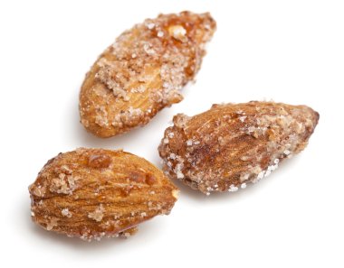 Fried almonds with sugar and cinnamon clipart