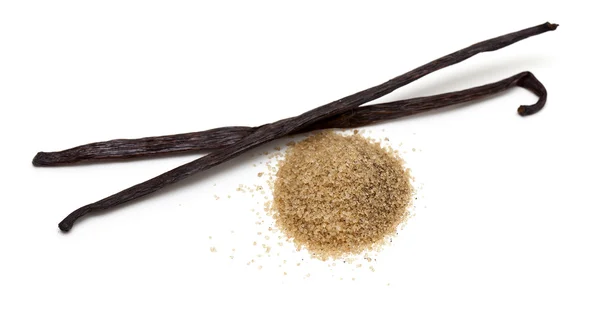 Ванильные бобы и коричневый ванильный сахар — стоковое фото