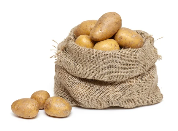 Patatas en bolsa de arpillera — Foto de Stock