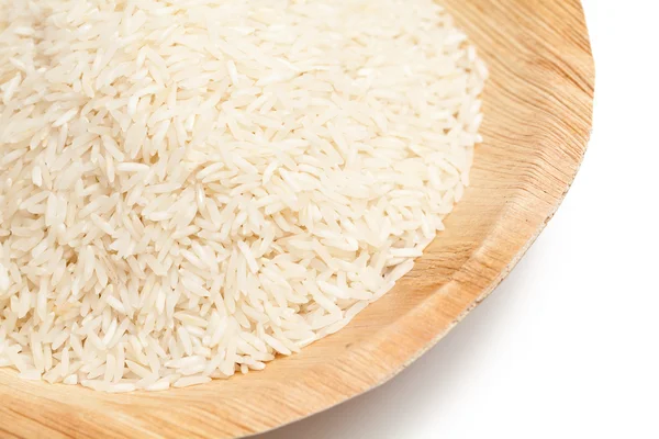 Ryż w misce liść palmowy — Zdjęcie stockowe