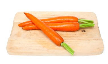 Carrots on wooden board