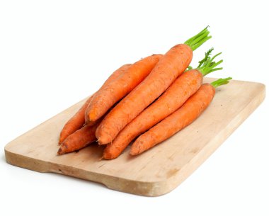 Carrots on wooden board