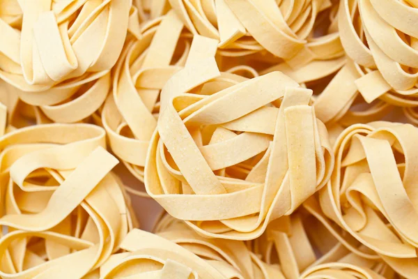 Pasta fettuccine background — Stock Photo, Image
