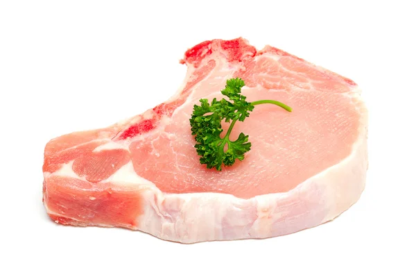 Pezzo di carne e ramoscello di prezzemolo — Foto Stock