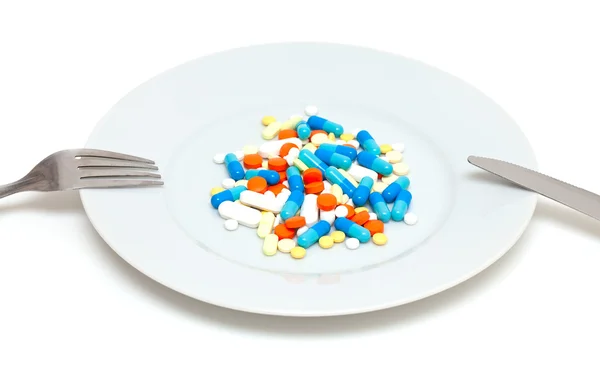 Tallrik med piller — Stockfoto