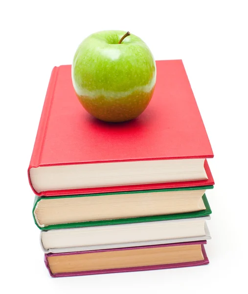 Manzana en la pila de libros — Foto de Stock