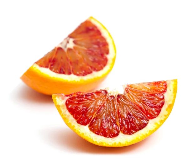 Červená oranžová zblízka na bílém pozadí — Stock fotografie