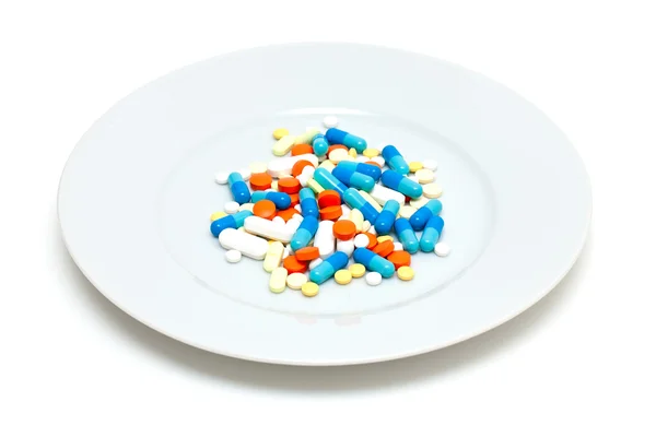 Plate with pills — Stock Photo, Image