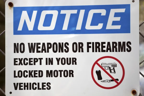 stock image Notice - no weapons allowed sign