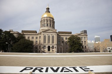 Helicopter landing in front of the State Capitol clipart