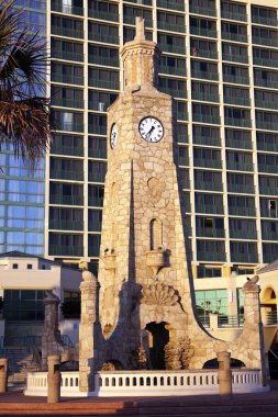Clock Tower on the beach clipart