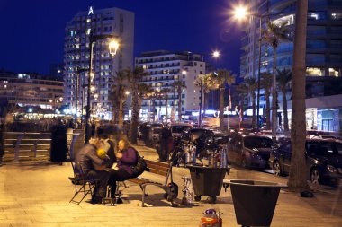 smoking nargilas in Beirut clipart