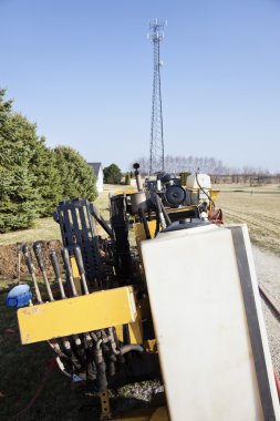 Directional boring and instaling the conduit for fiber clipart