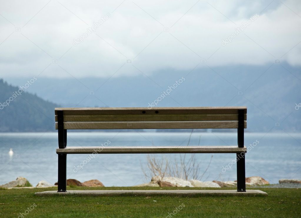 Empty bench facing Harrison lake