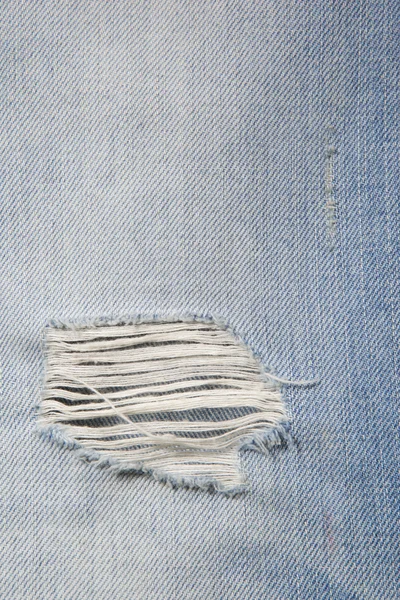 Hole in jeans — Stock Photo, Image