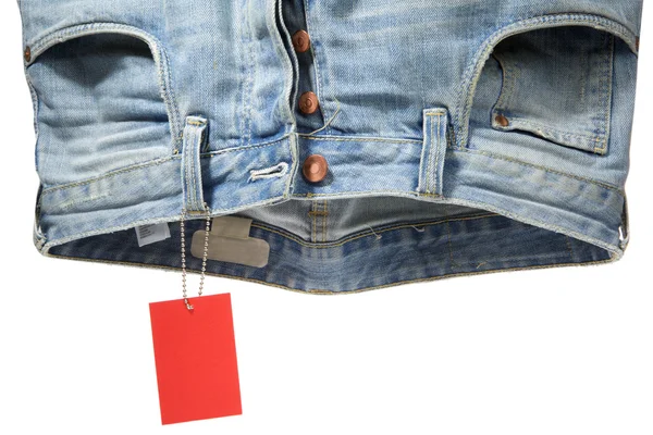 Jeans und Etikett — Stockfoto