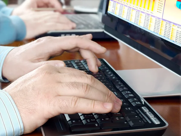 Hands typing on computer keyboard — Stock Photo, Image