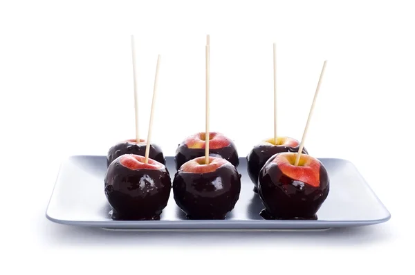 Apples in chocolate — Stock Photo, Image