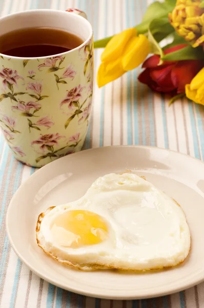 Heart shape fried egg — Stock Photo, Image