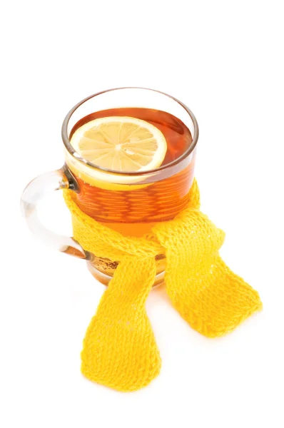 Tea with lemon cup wrapped in scarf — Stock Photo, Image